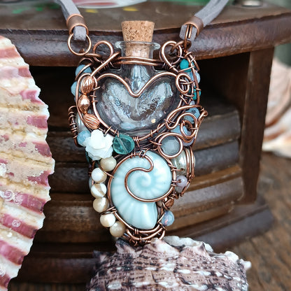 Heart of the ocean. Reversible vial necklace
