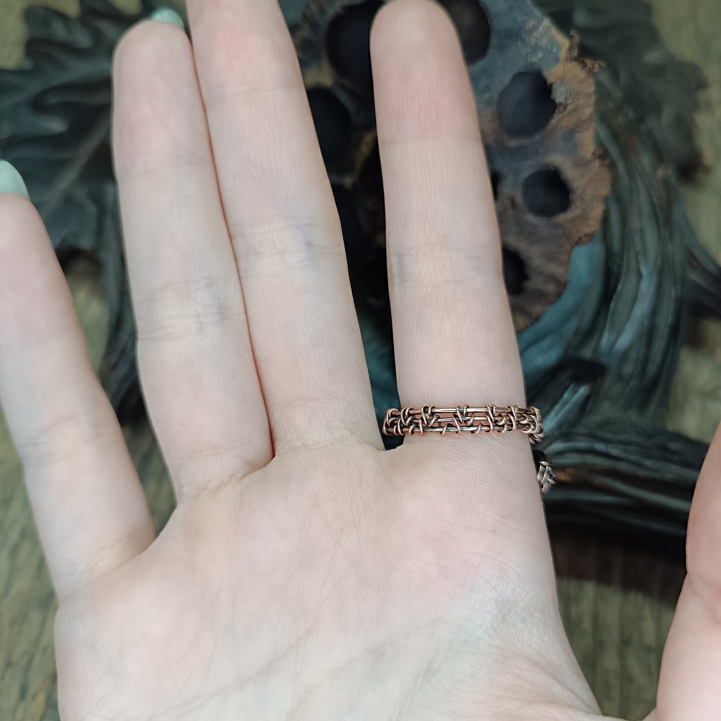 Raven ring.