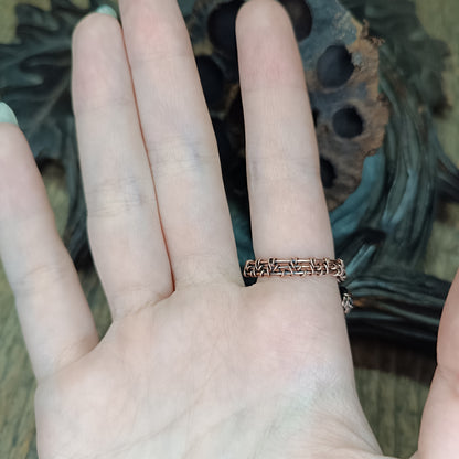 Raven ring.