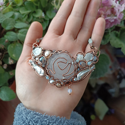 First snow. Rose necklace.