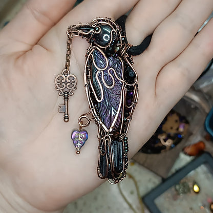 Magestic raven with the purple wings!