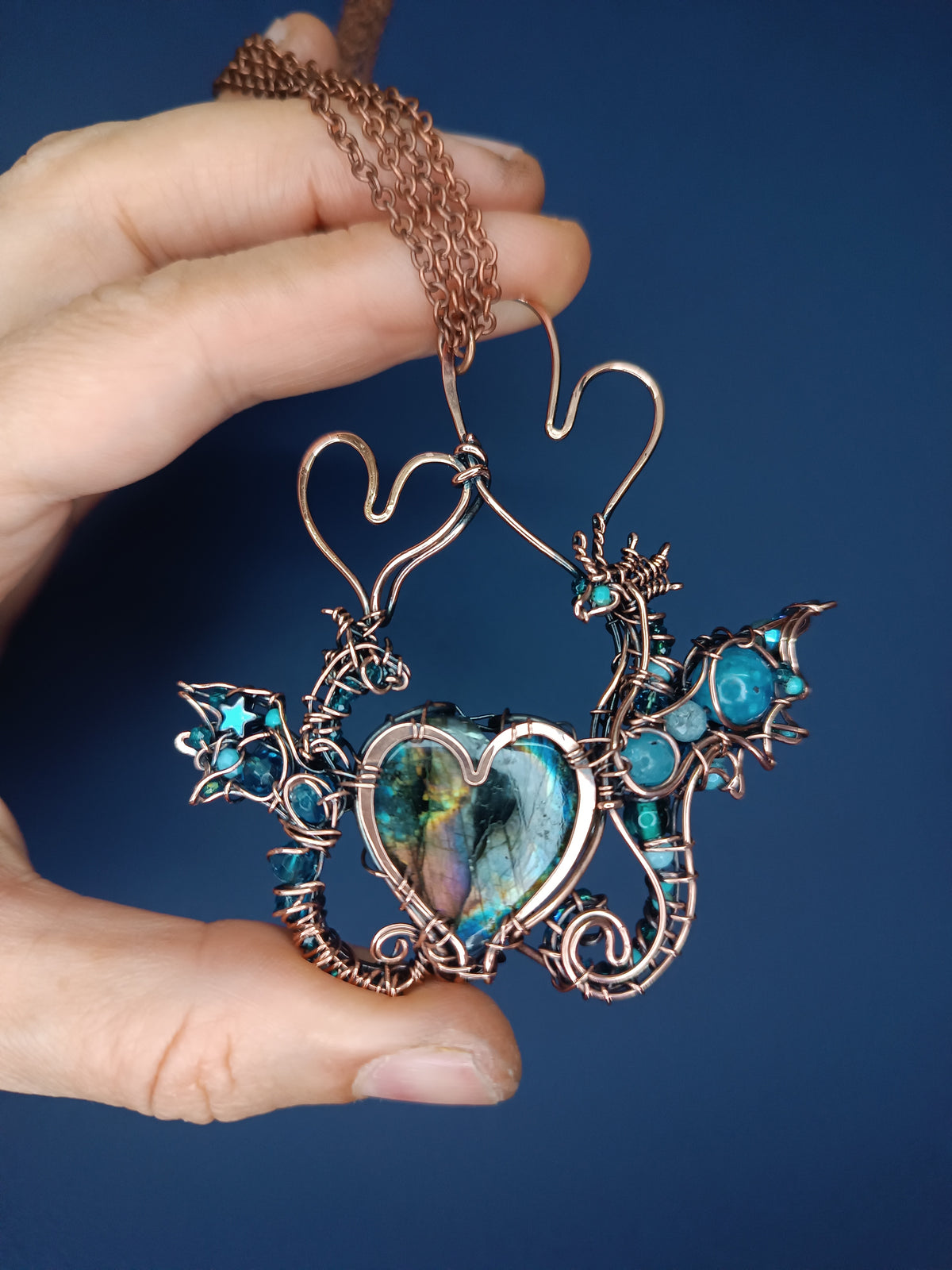"Love you!" Dragons necklace.