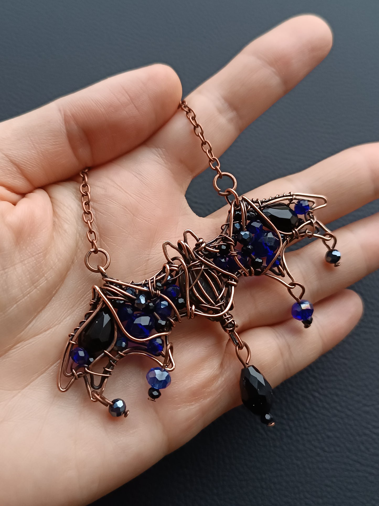 Midnight whisper. Bat necklace.