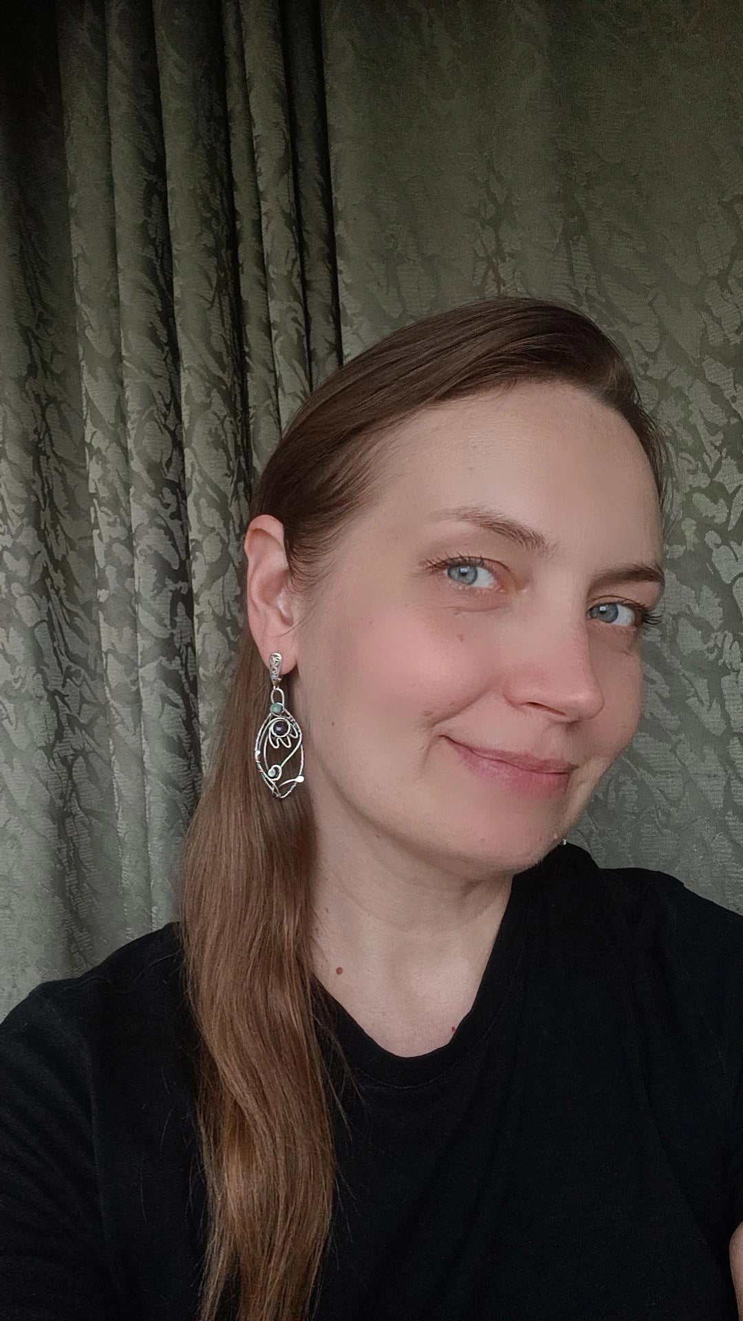 Silver dangling earrings. Amethyst bells.