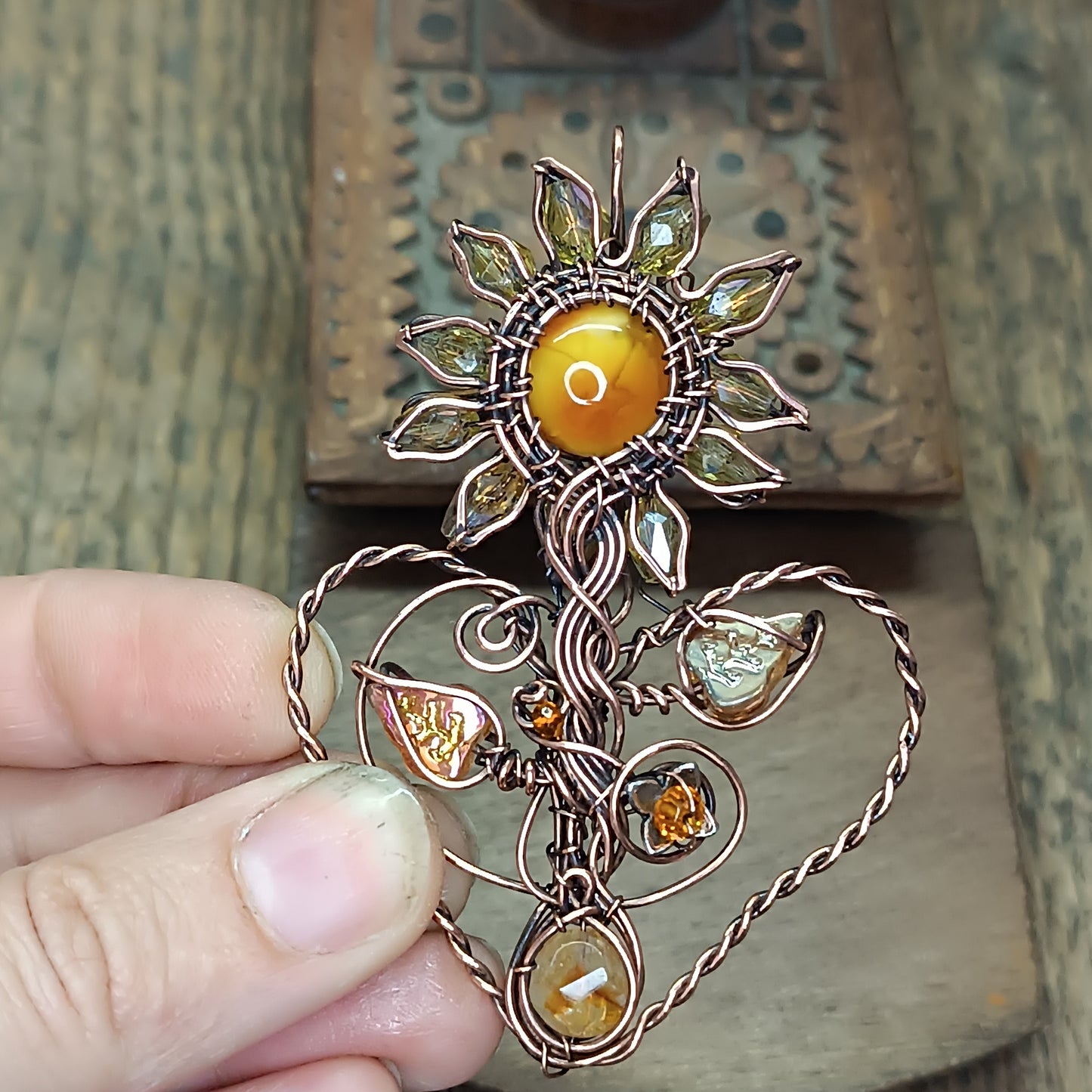 Sunflower pendant with citrine root.