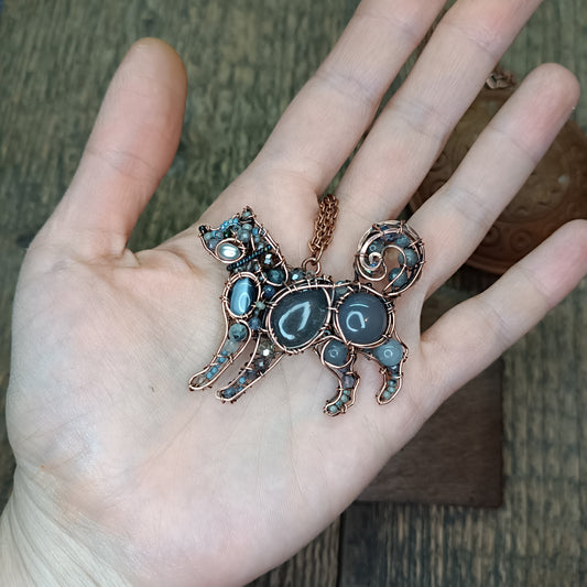 Sweet puppy. Detailed wire wrapped and beaded pendant.