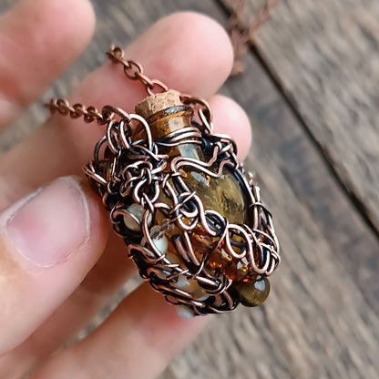 For Susan. Paw vial pendant