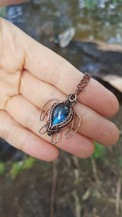 Little dark blue labradorite sea turtle charm.