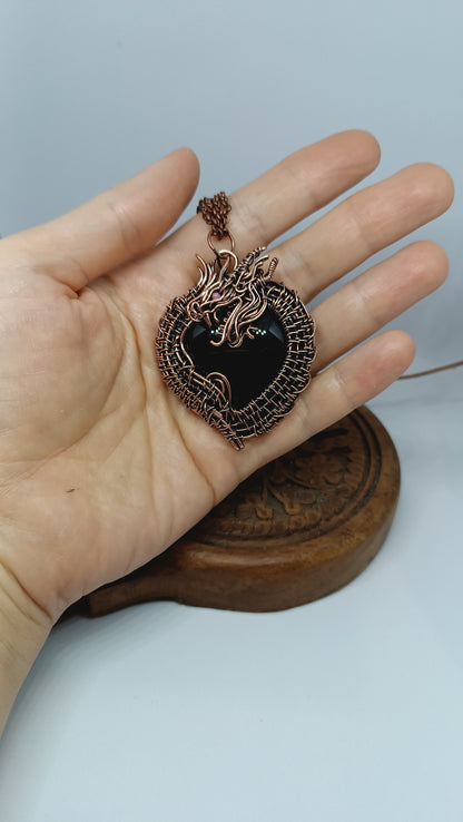 Black obsidian dragon pendant.