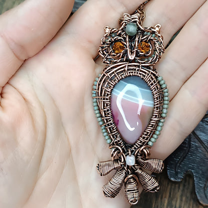 Owl necklace.