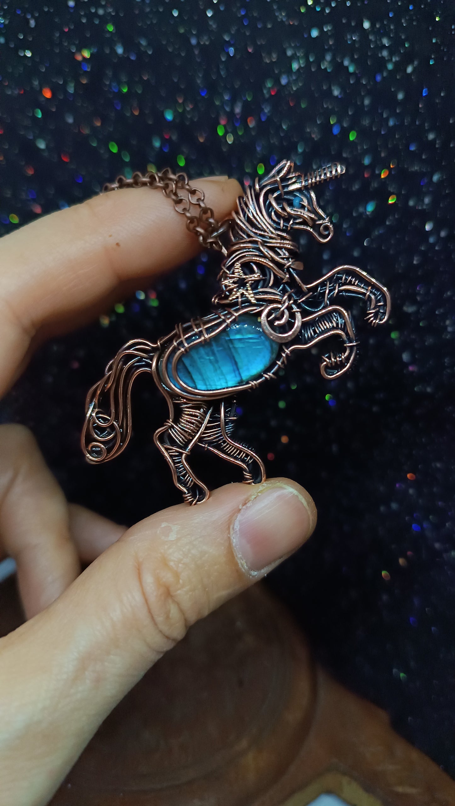 Unicorn and the falling star. Copper pendant with labradorites.