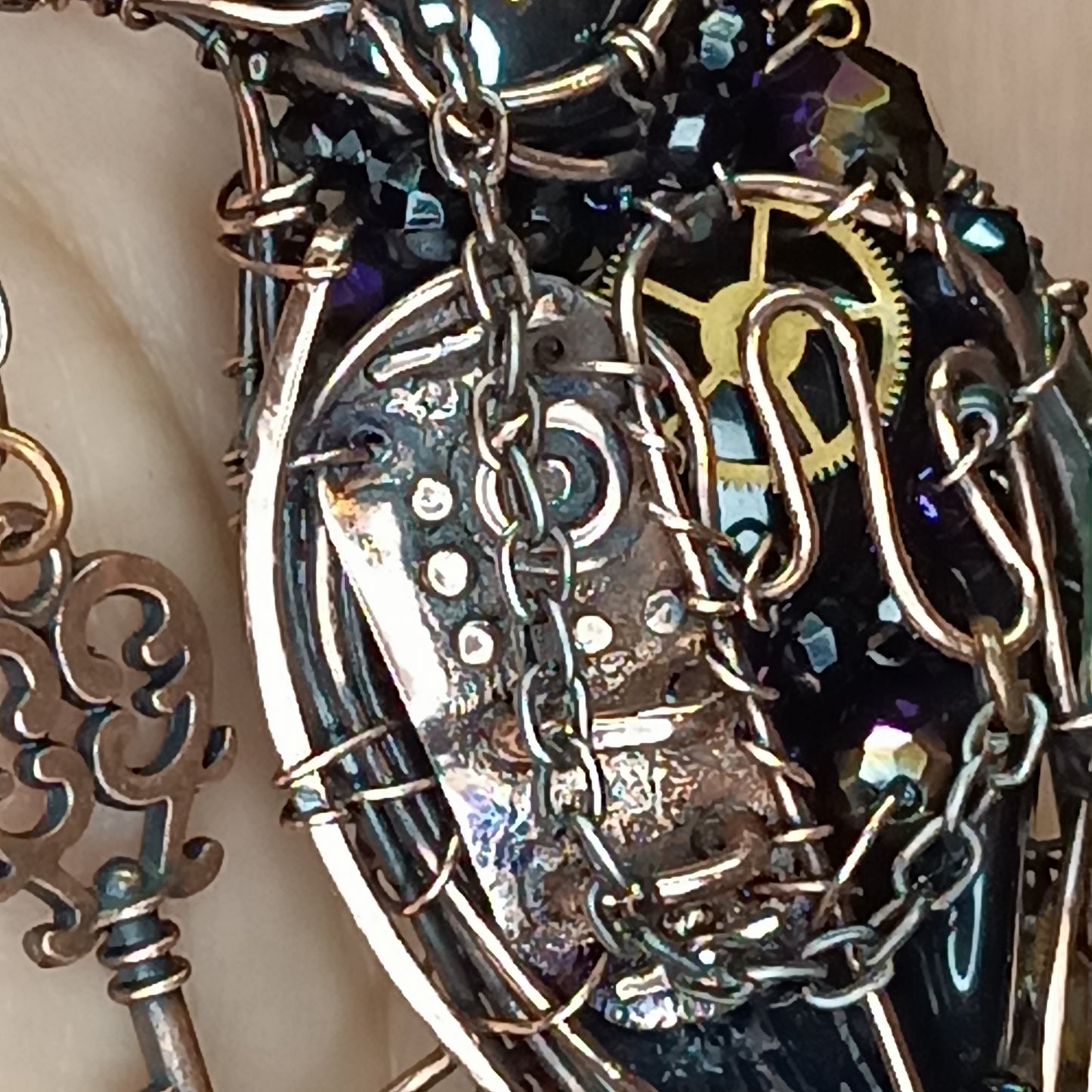 Steampunk raven necklace.