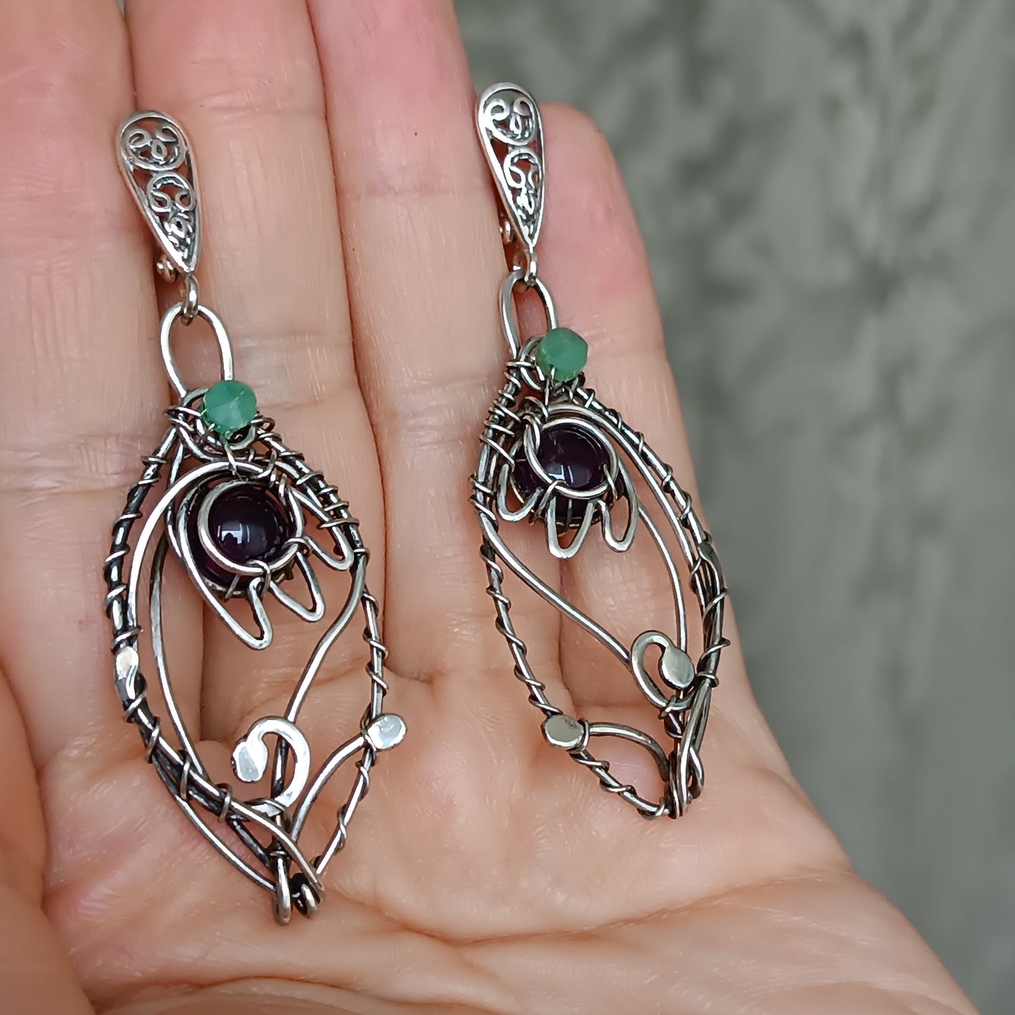 Silver dangling earrings. Amethyst bells.