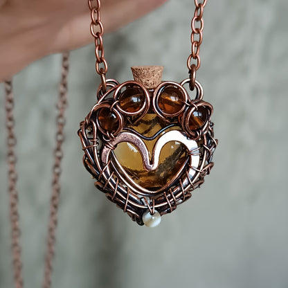 For Susan. Paw vial pendant