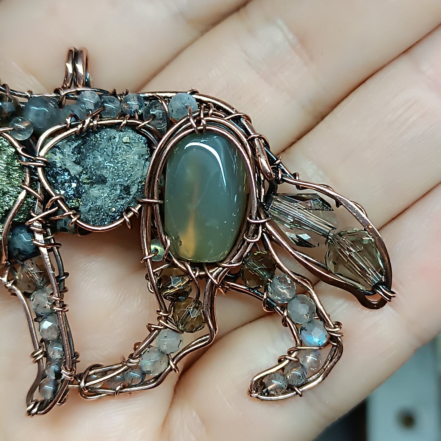 For Julia. Wolf pendant