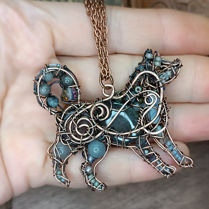 Sweet puppy. Detailed wire wrapped and beaded pendant.