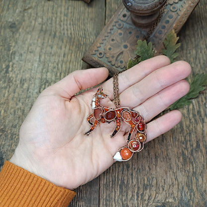 Foxy the swoopy tail! Copper necklace with carnelians.