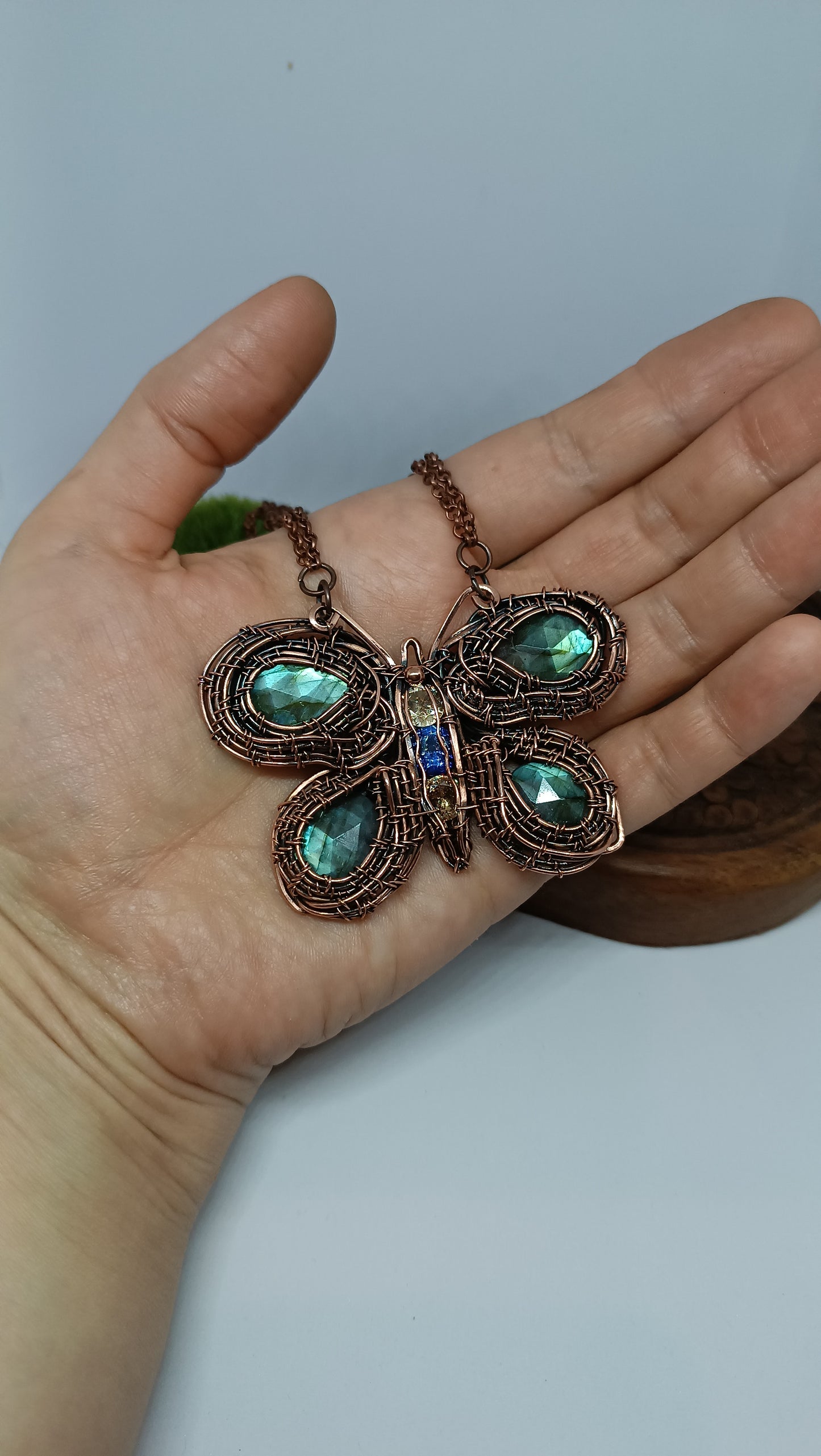 Copper wire wrapped butterfly necklace with faceted labradorites