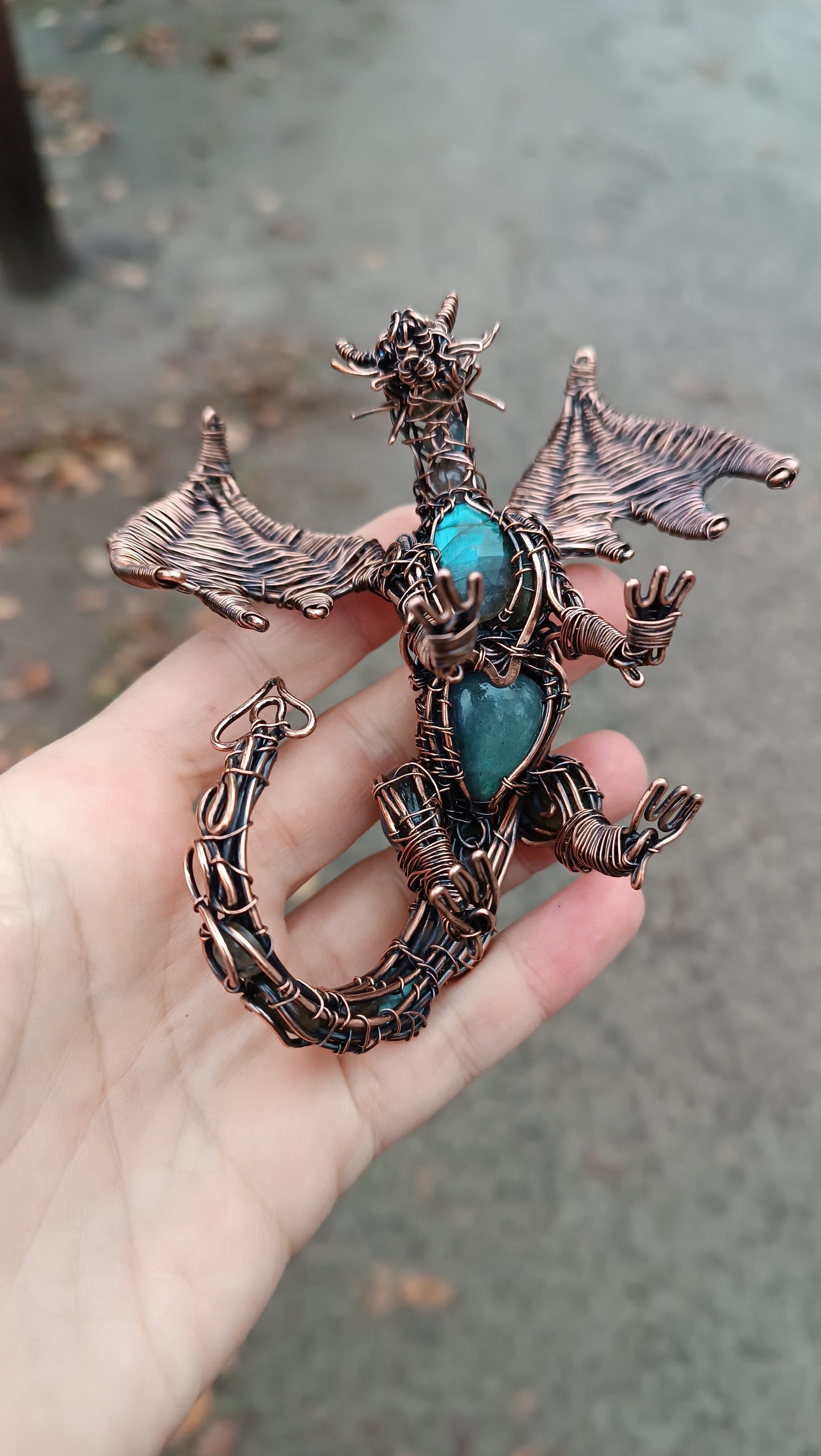 Dragon figurine with labradorites.