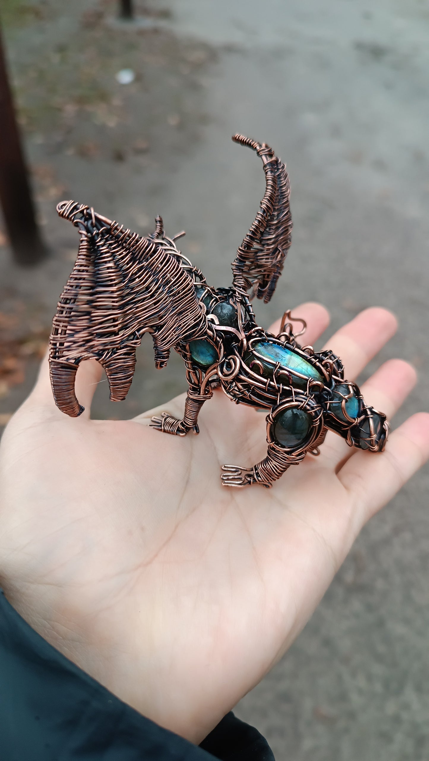 Dragon figurine with labradorites.