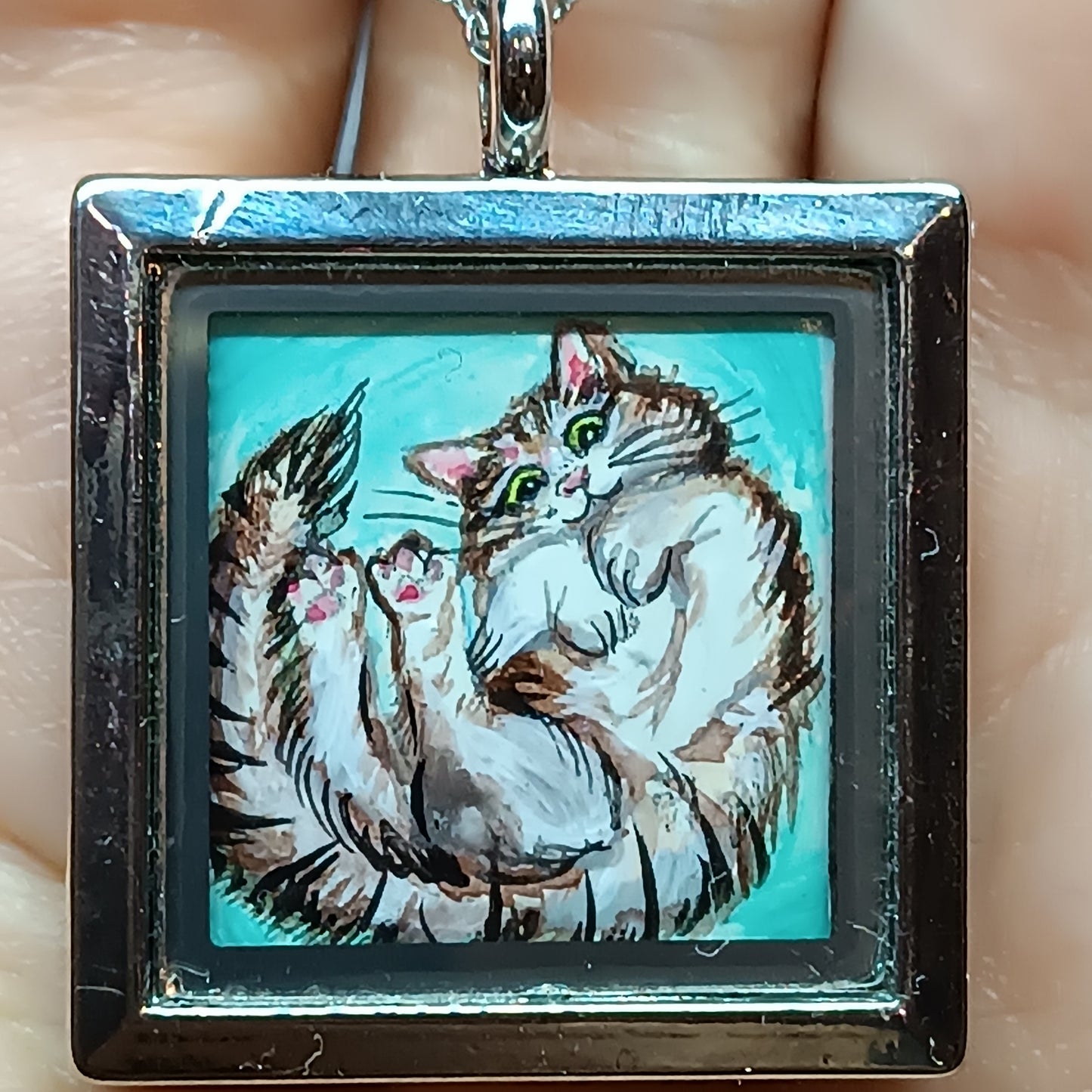 Cats in the box! Hand painted pendant. Reversible.