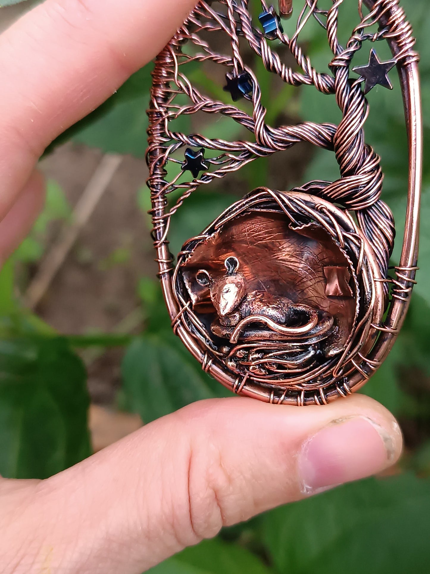 Mouse in the nest necklace.