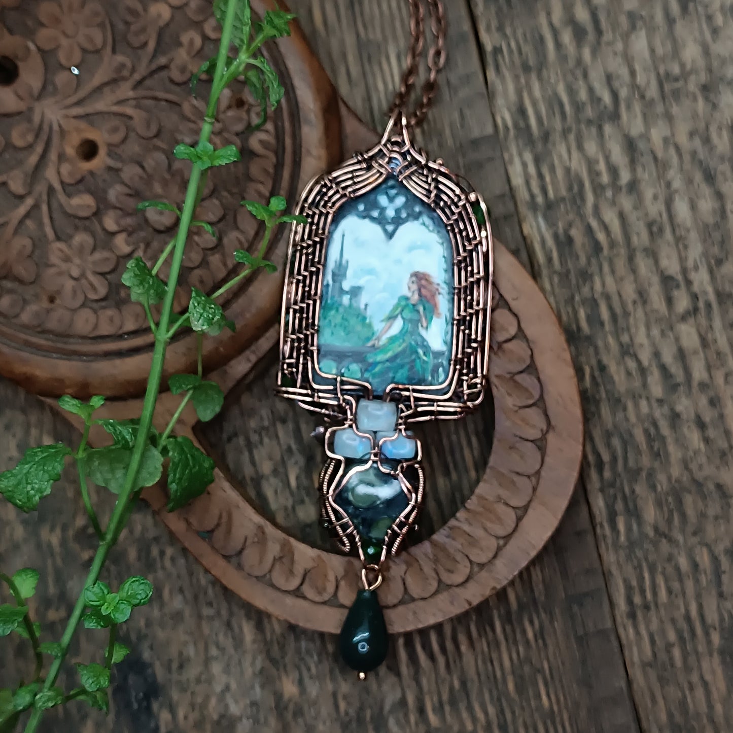 The ballad of white unicorn and princess. Wire wrapped necklace with miniature paintings.