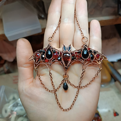 For Paige. Scarlett and black bat necklace