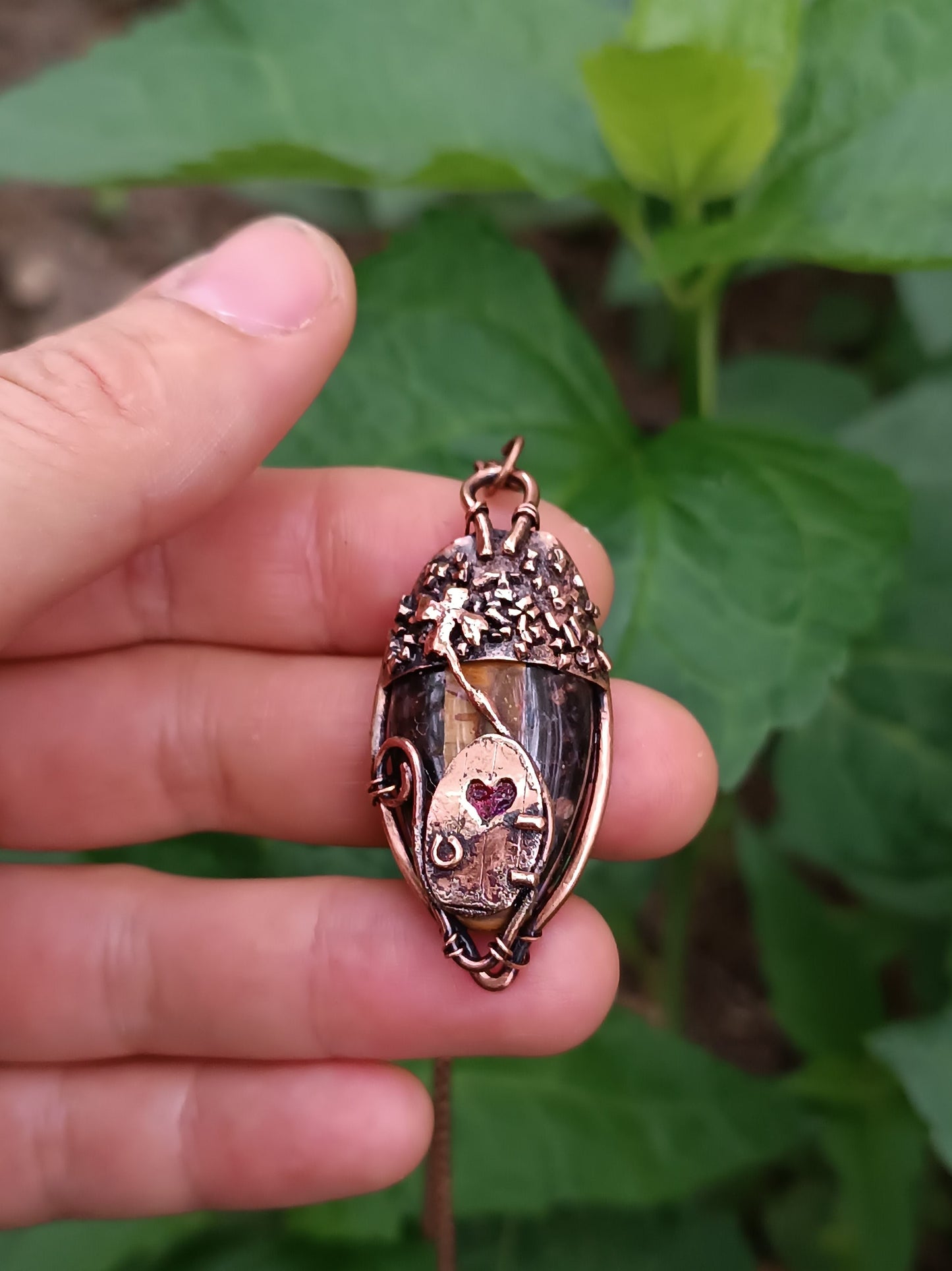 Acorn fairy house pendant.