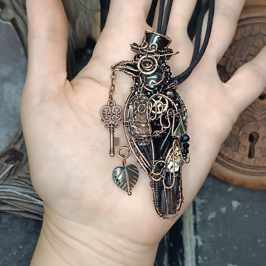 Steampunk raven necklace.