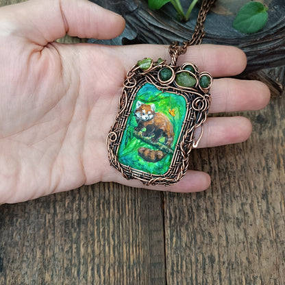 Red panda and a butterfly necklace. Reversible.
