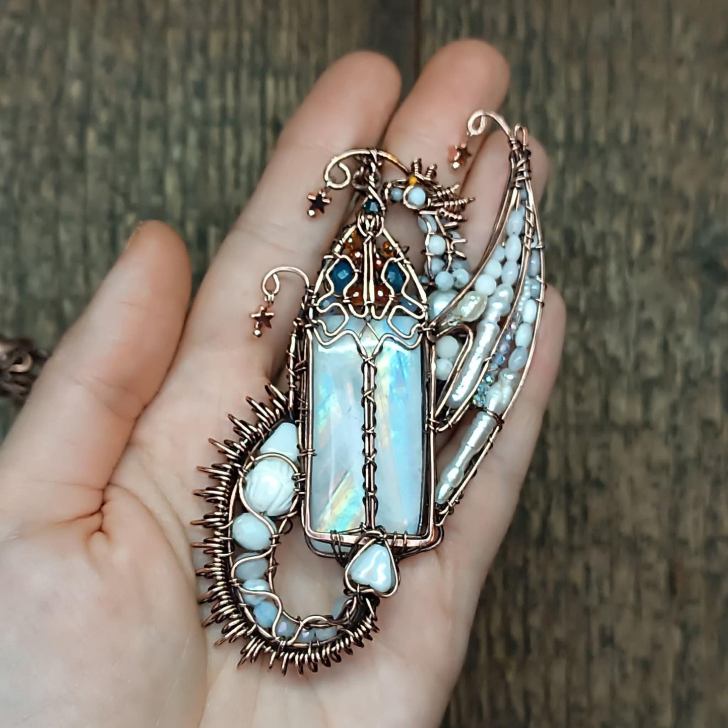 The ballad of the Pearl Dragon and the Moonstone Castle. Wire wrapped necklace