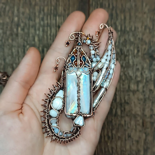 The ballad of the Pearl Dragon and the Moonstone Castle. Wire wrapped necklace