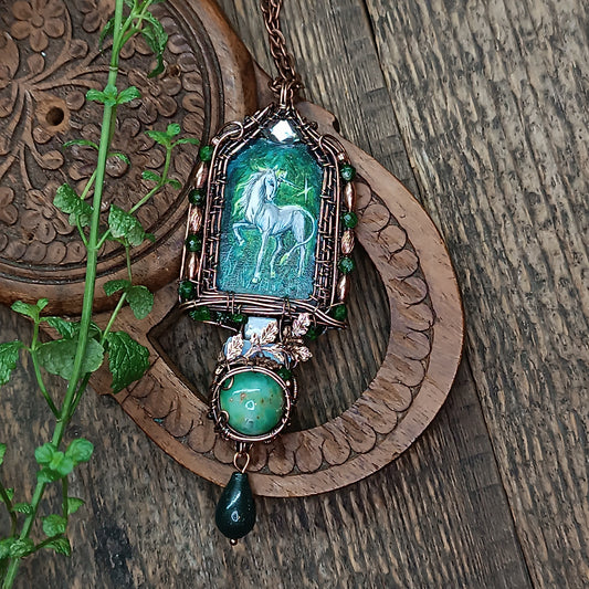 The ballad of white unicorn and princess. Wire wrapped necklace with miniature paintings.