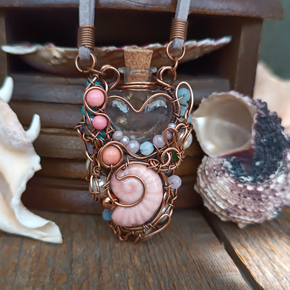 Heart of the ocean. Reversible vial necklace