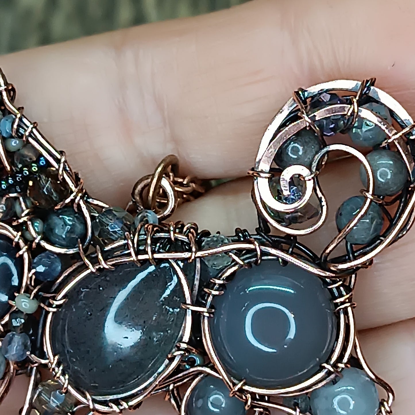 Sweet puppy. Detailed wire wrapped and beaded pendant.