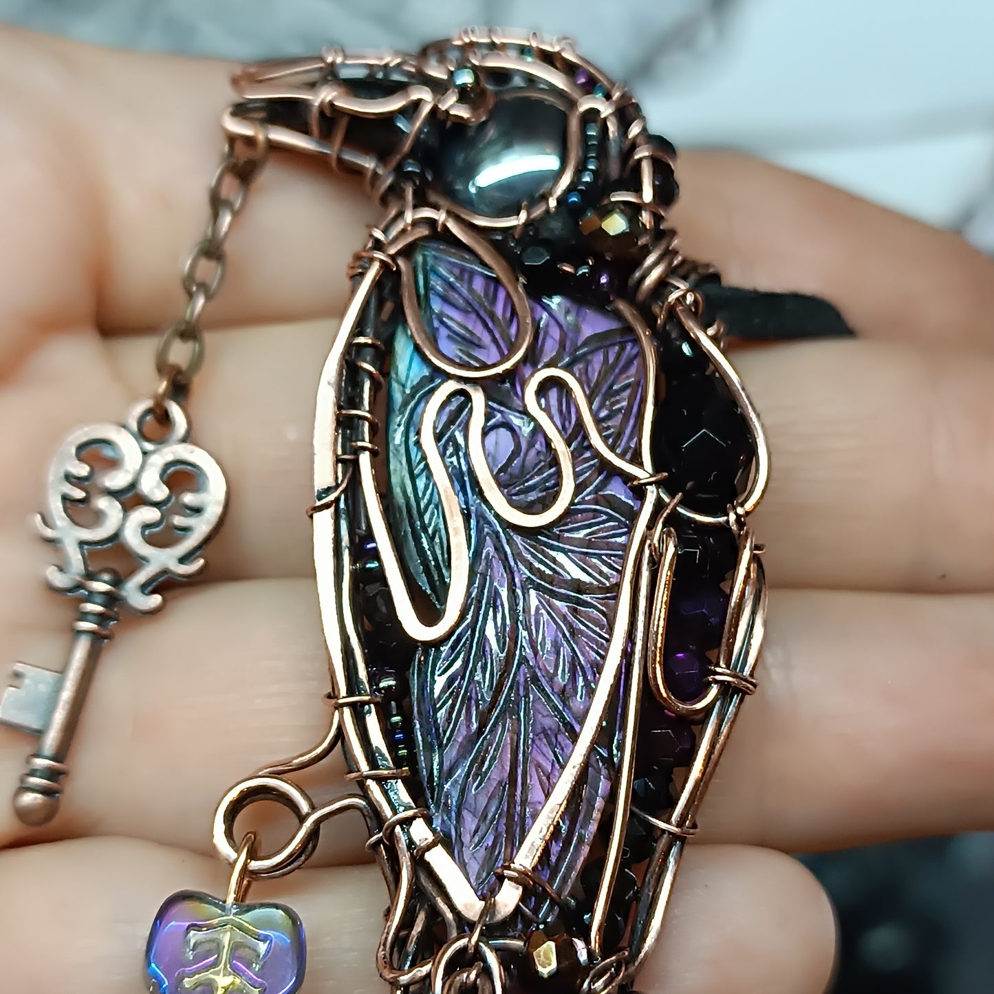 Magestic raven with the purple wings!