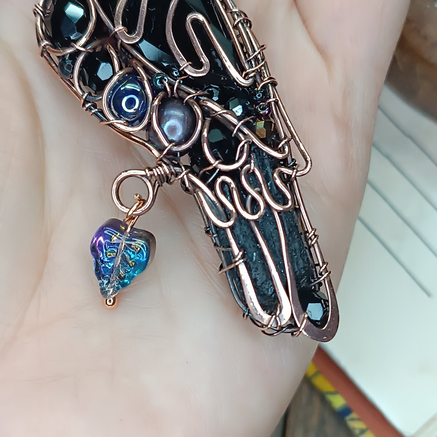 Mr Raven, the Secret Keeper necklace.