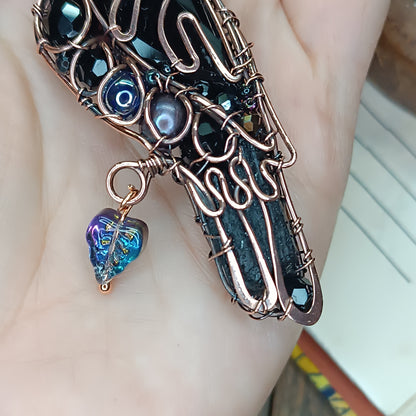 Mr Raven, the Secret Keeper necklace.