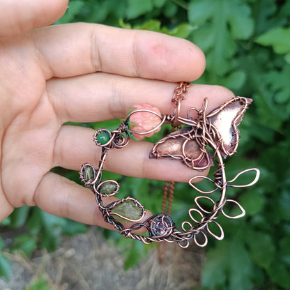 Life circle. Pink raspberry butterfly necklace