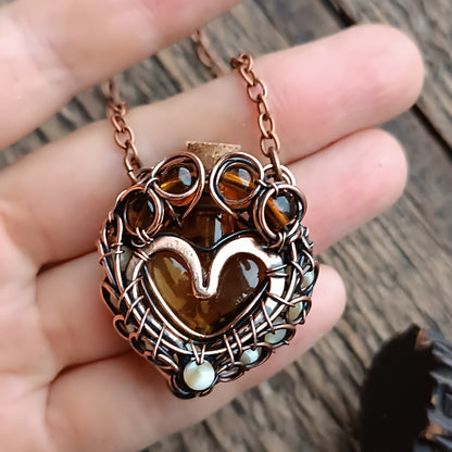 For Susan. Paw vial pendant