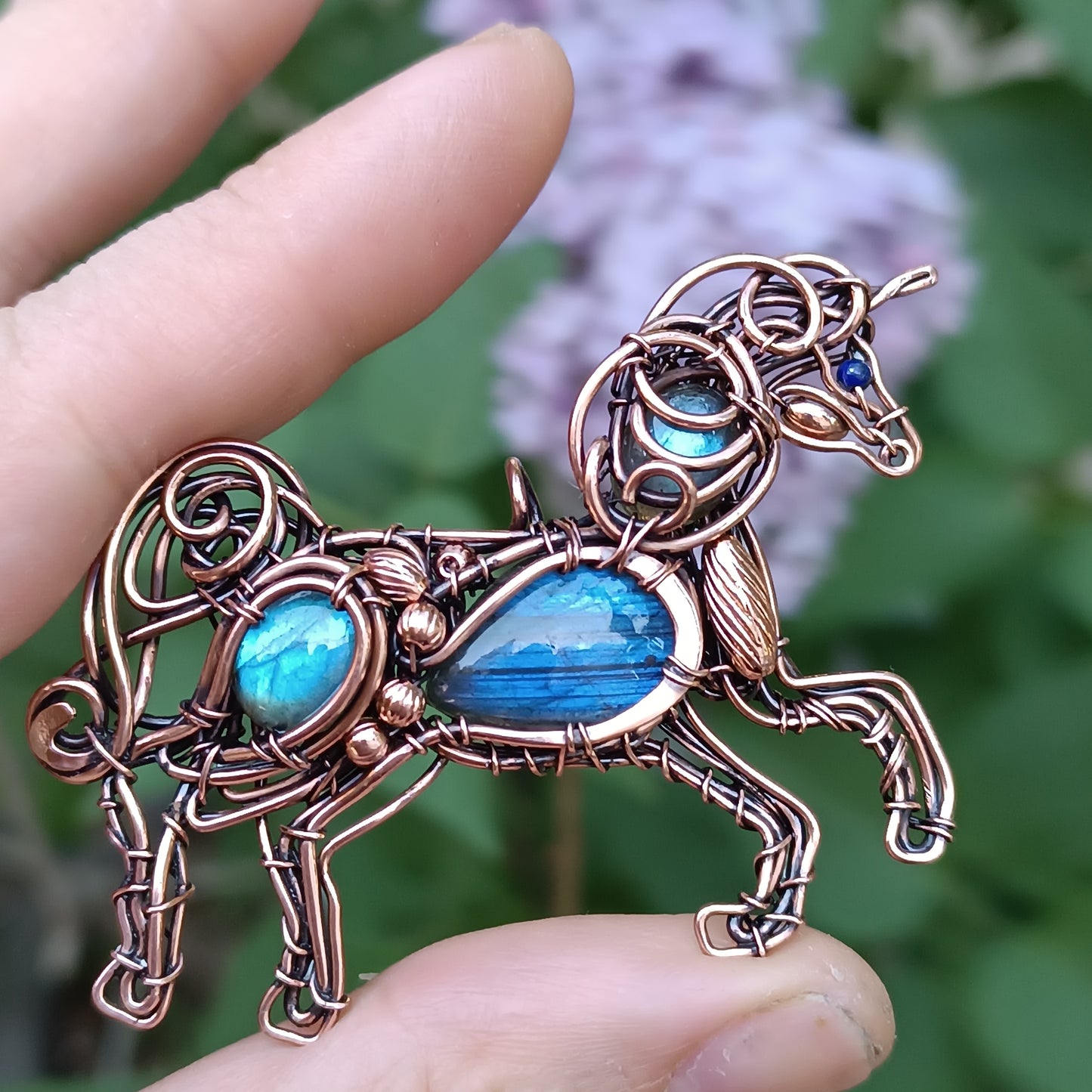 Blue wind. Unicorn pendant.