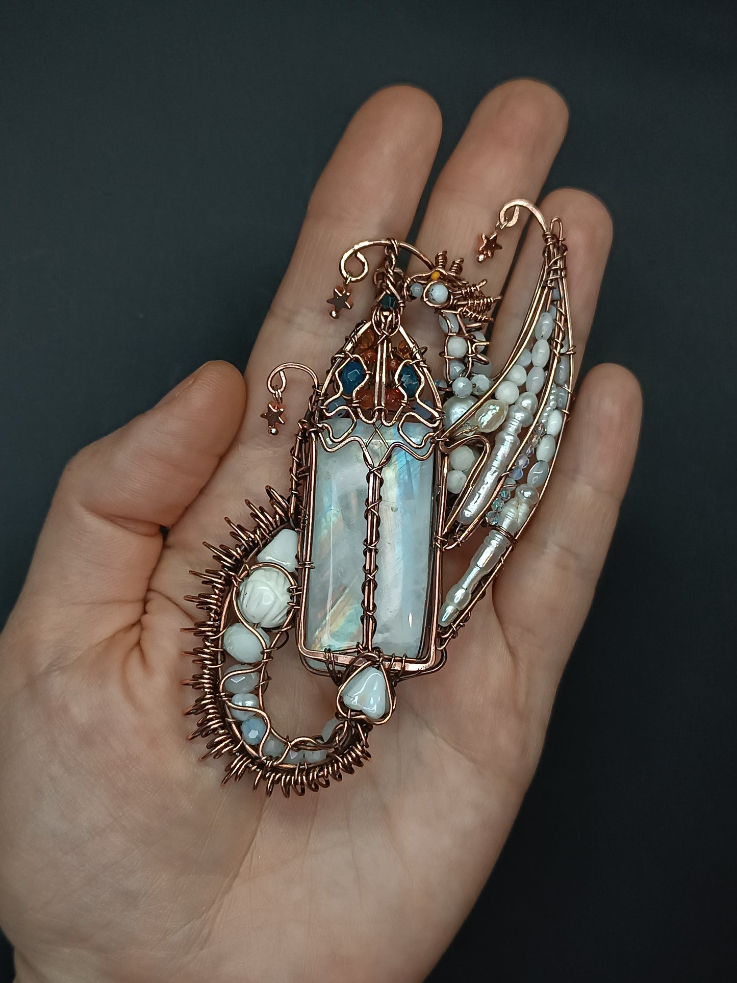 The ballad of the Pearl Dragon and the Moonstone Castle. Wire wrapped necklace