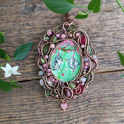 Charming possums and cherry blossom. Wire wrapped 2 sided necklace with miniature paintings