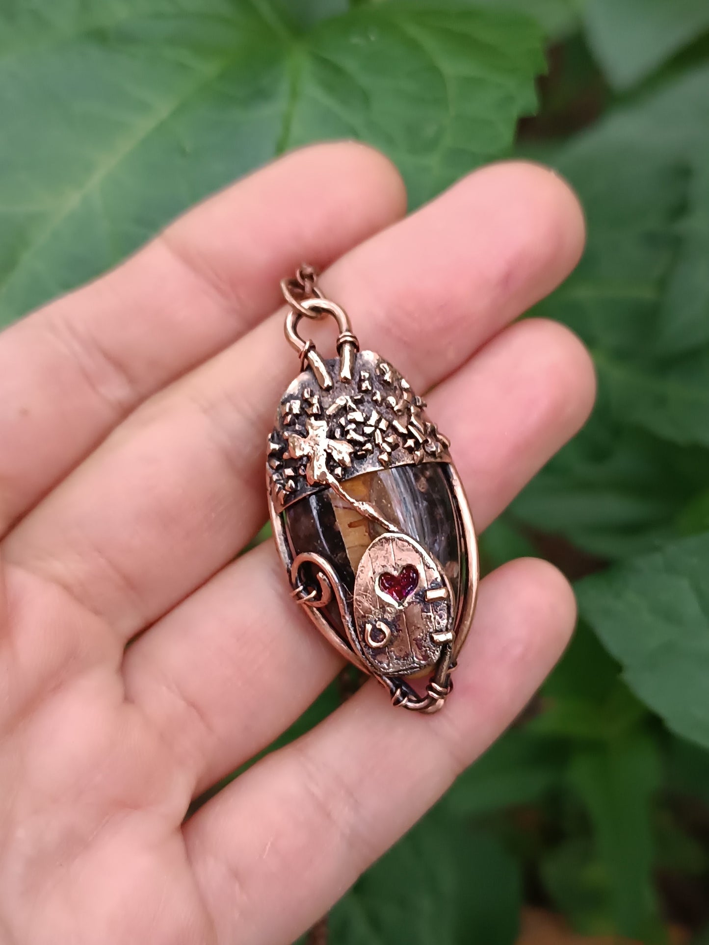 Acorn fairy house pendant.