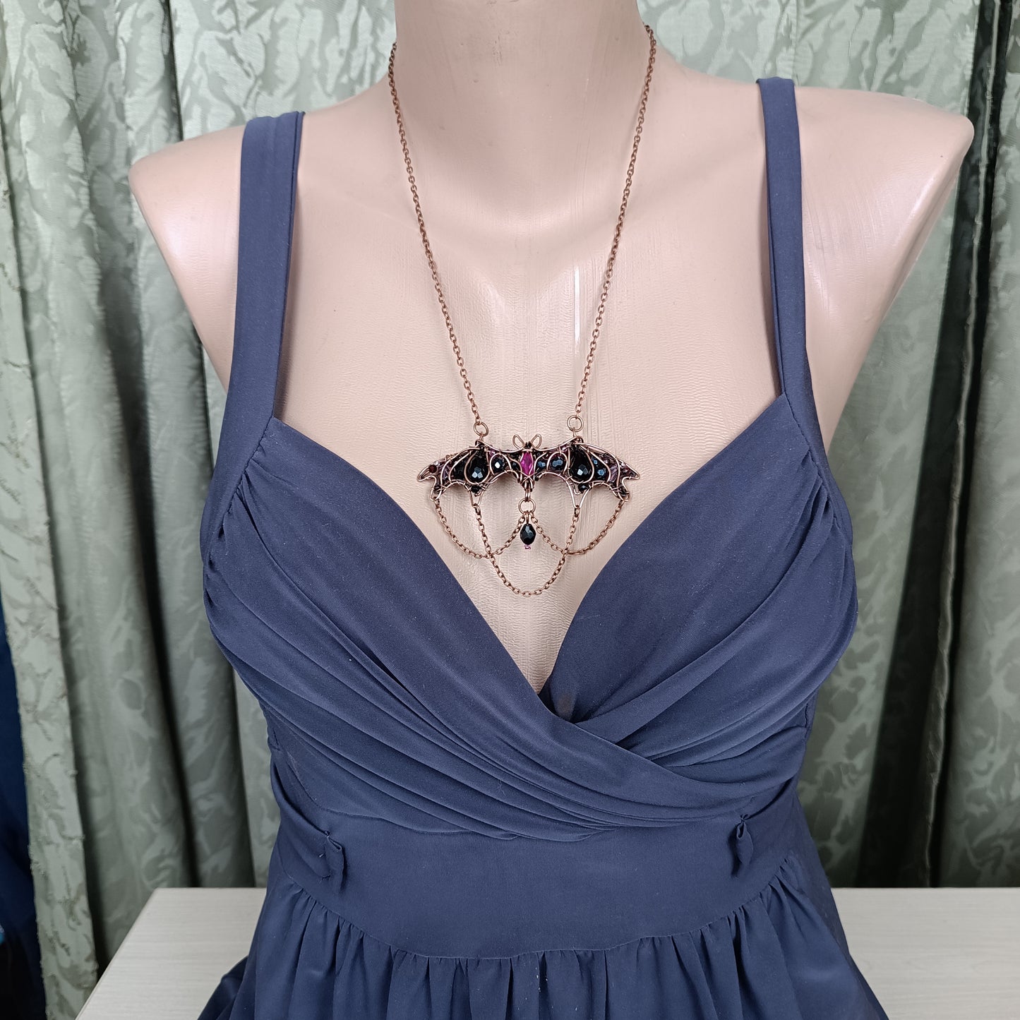 Dark lady. Bat necklace