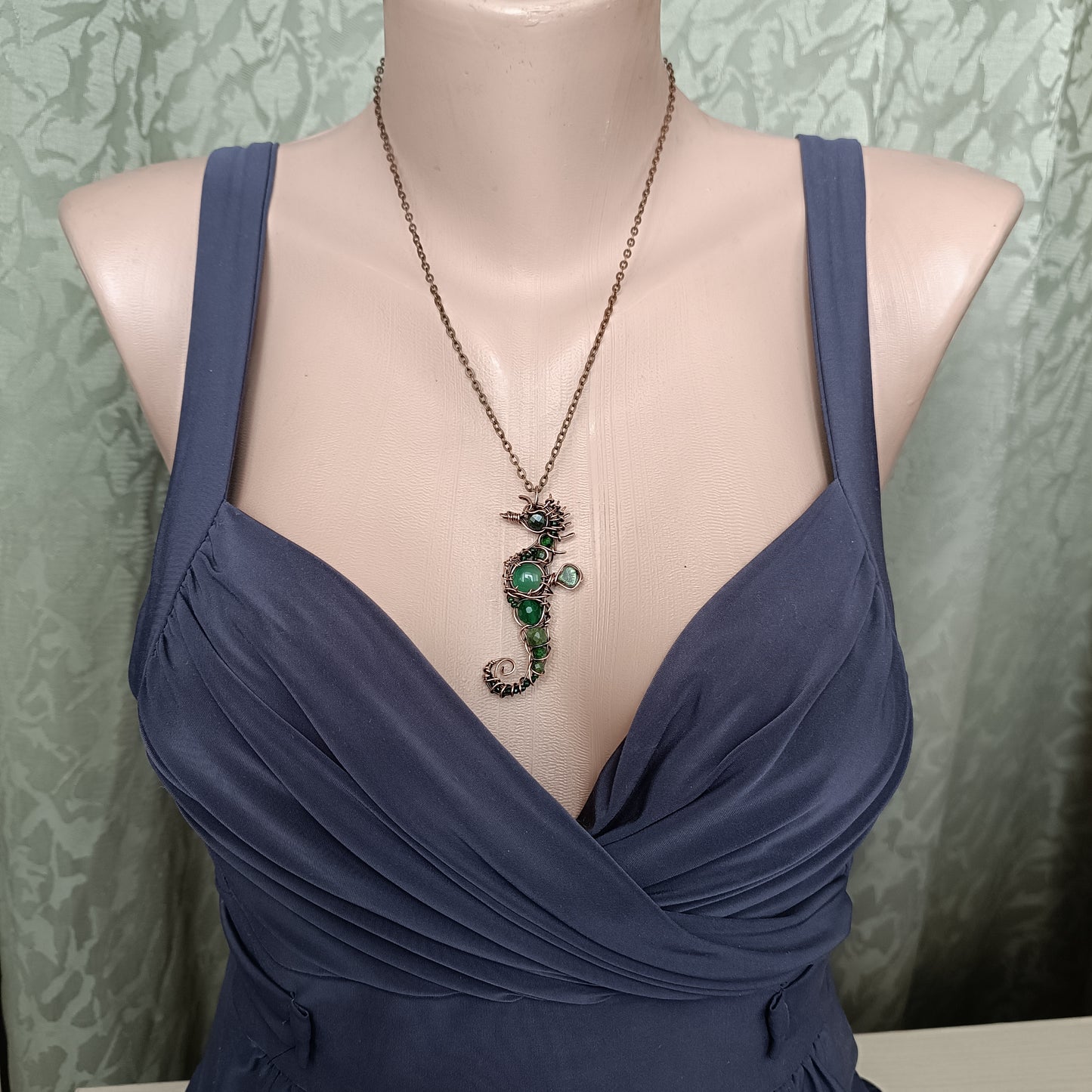 Green seahorse pendant