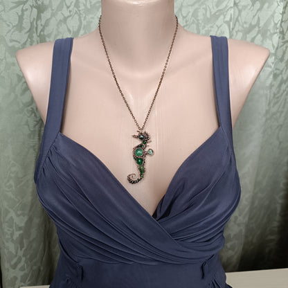 Green seahorse pendant