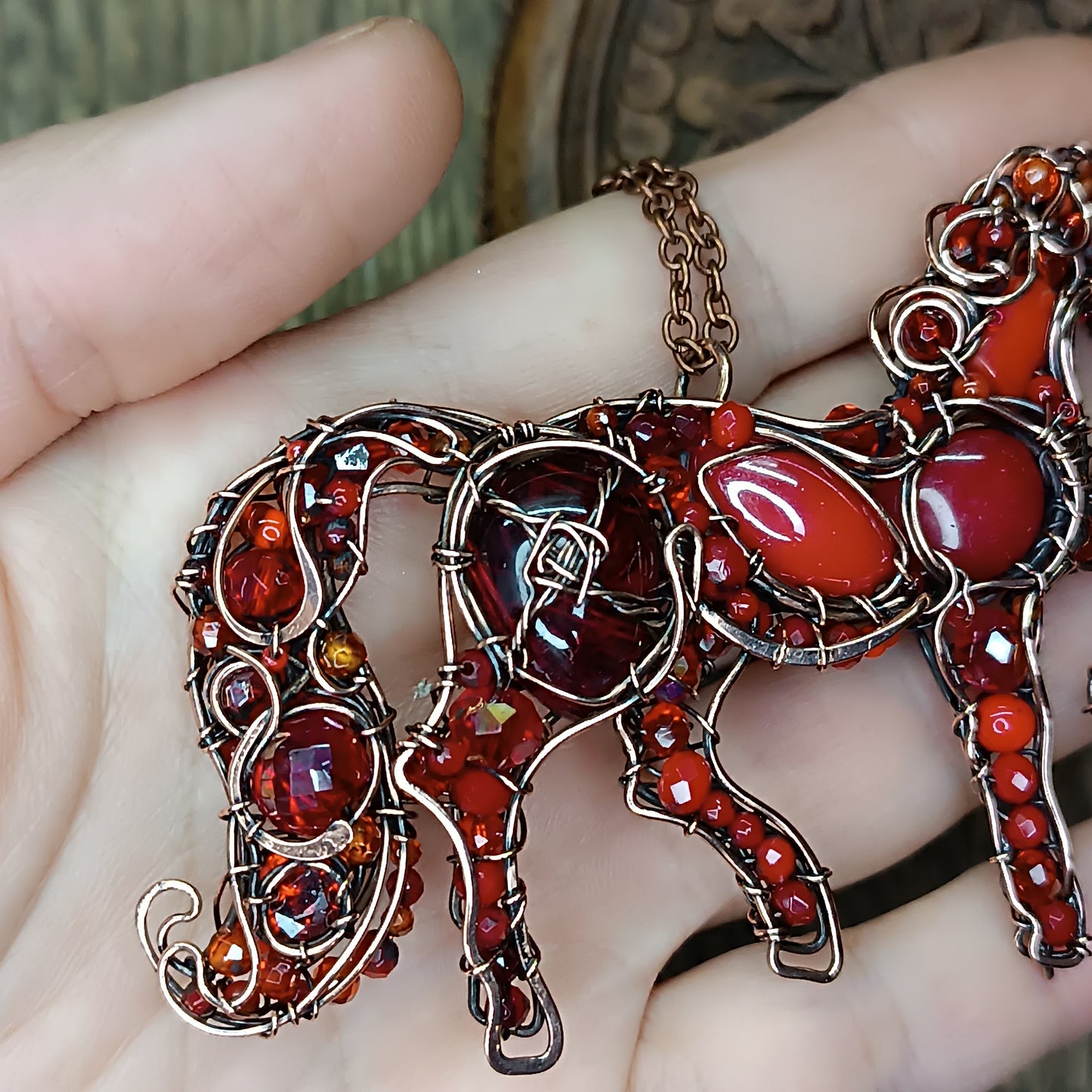 Red horse pendant.