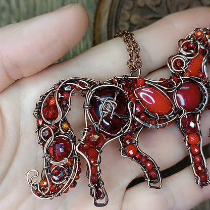 Red horse pendant.